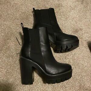 Black slip on heeled boots